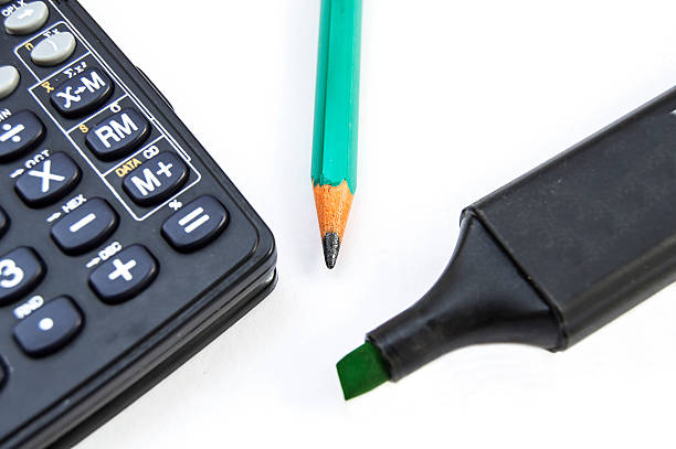 Calculator and pencil office stock photo