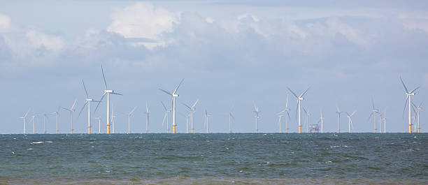 istock Wind turbines in sea 509582827