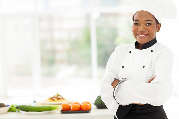istock african american female chef with arms folded 509583185