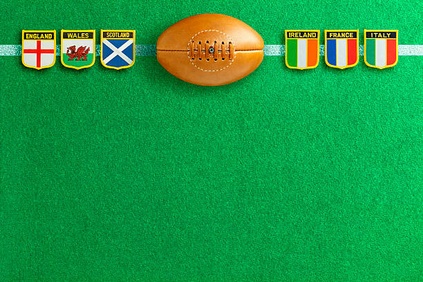 Rugby Football Six Nations The Six Nations Rugby Tournament is an annually contested rugby union competition involving six European teams, England, Ireland, Scotland, Wales, France and Italy, as depicted by the 6 National Flag badges on a grass pitch background.  Good copy space. international match stock pictures, royalty-free photos & images