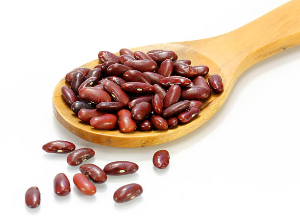 istock Kidney beans in a wooden cooking spoon 509585635