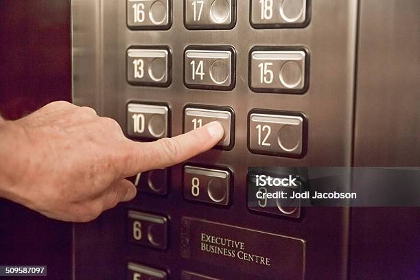 Pushing Elevator Buttons Stock Photo - Download Image Now - Elevator, Horizontal, Human Body Part