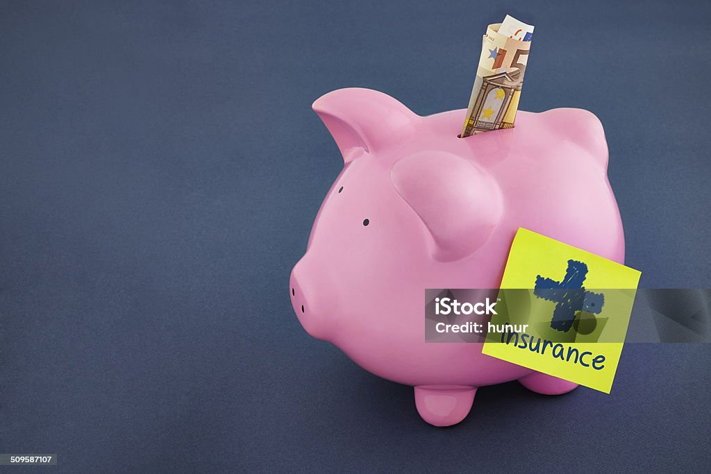 Piggy Bank for insurance Piggy Bank with money and insurance on sticky note Adhesive Note Stock Photo