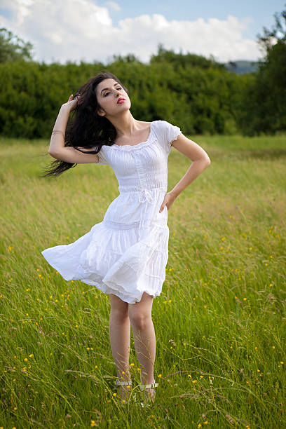 istock Sexy young woman on grass field 509590643