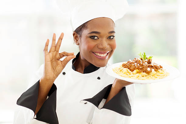 istock young african chef with delicious pasta 509608751