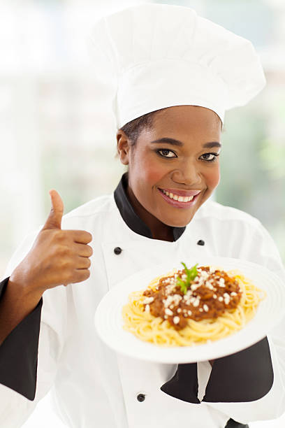 istock female african american chef giving thumb up 509608755