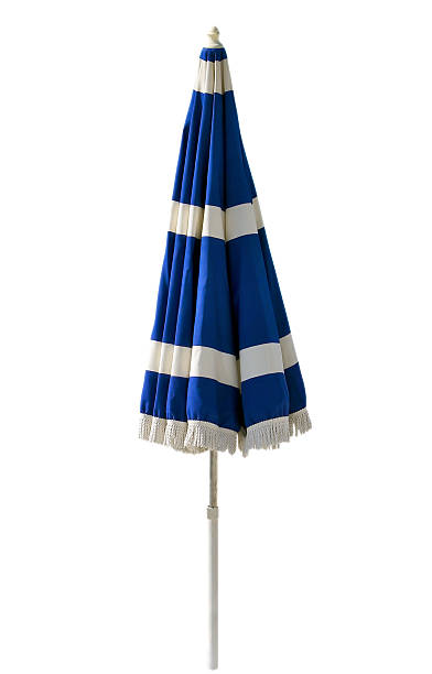 Blue beach umbrella isolated on white Blue beach umbrella isolated on white. Clipping path included. beach umbrella stock pictures, royalty-free photos & images