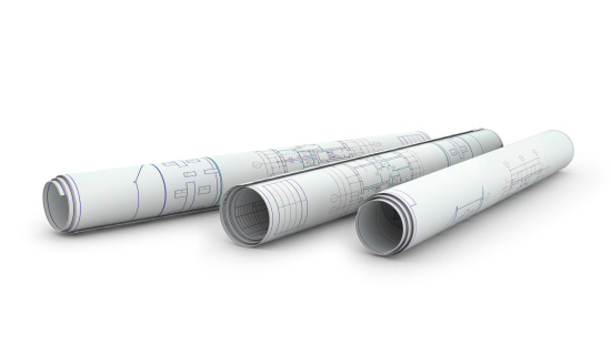 Scrolls of engineering drawings. Isolated render on a white background