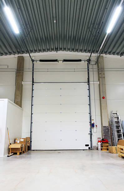 istock Shutter door or rolling door in the warehouse. 509609876