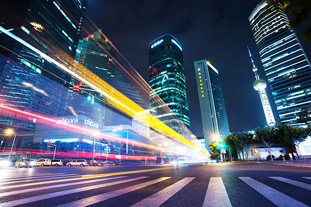 istock traffic through modern city with blur light 509610353