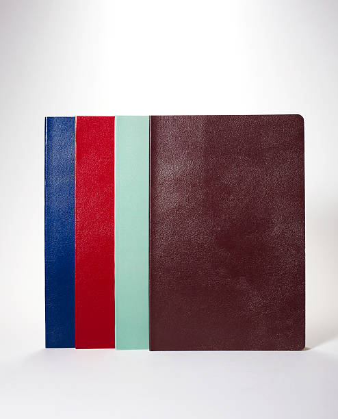 istock Four color notebooks on the white background 509611101