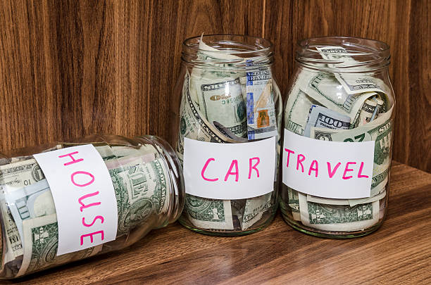 istock Saving dollar bills in three glass jar 509611346