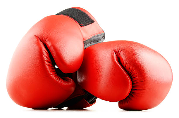 istock Pair of red leather boxing gloves isolated on white 509611360