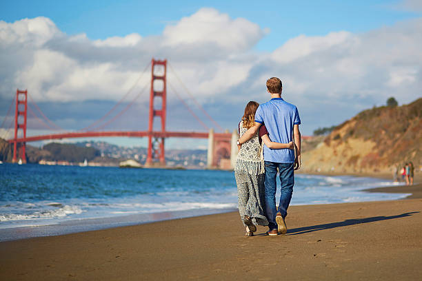 Romantic loving couple on Baker beach in San Francisco