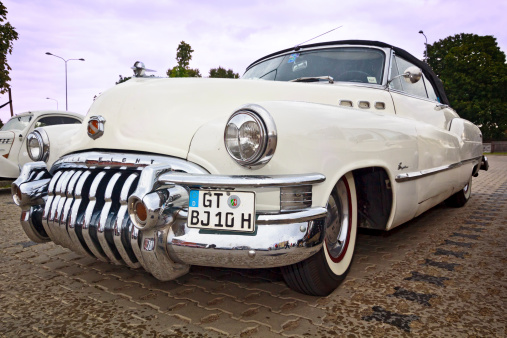 Szczecin, Poland - August 29, 2014: Renovated old 1950 Buick Eight Super convertible 2 door in the parking lot in the Szczecin city center. The Buick eight was produced from 1931 to 1953 and sold in Buick automobiles.