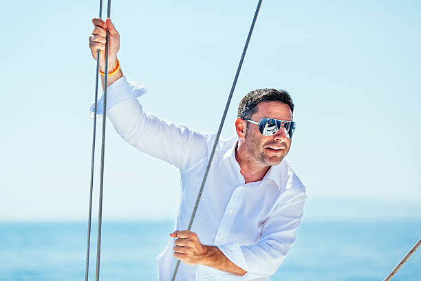istock Man enjoying sailing with sailboat 509612448