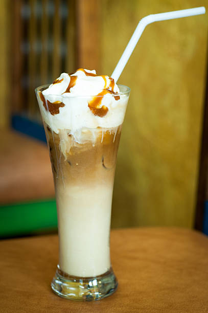 istock cold creamy coffee in hight glass 509612817