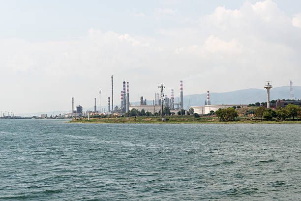 istock Sea and sky with factories 509613717