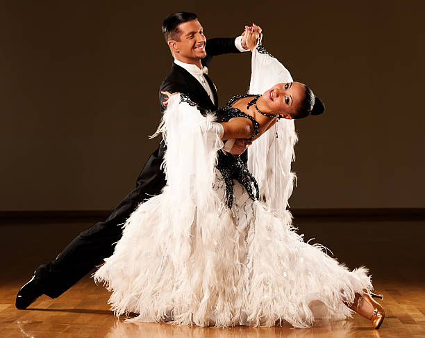 legs man and woman dancers on parquet floor ballroom dancing