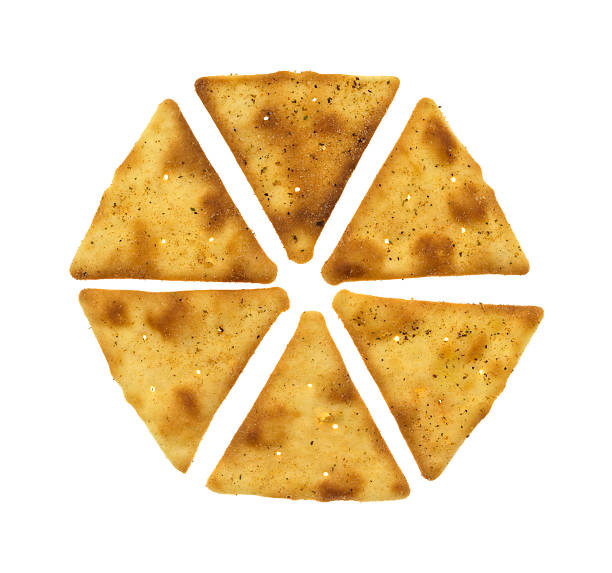 Crispy pita snack crackers top view Top view of a group of pita crispy snack crackers. pita bread stock pictures, royalty-free photos & images