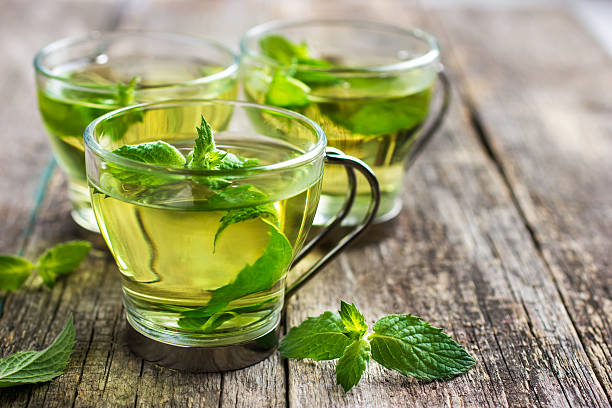 istock Hot mint tea in glass cup 509615662