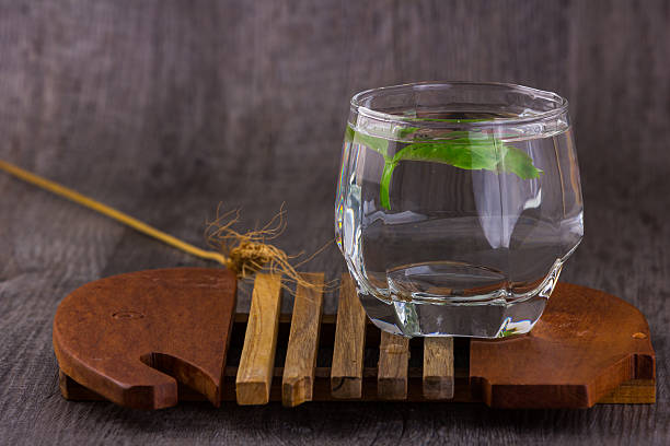 istock water in glass old wood background 509618446