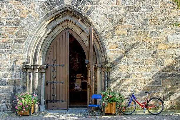 Photo of Priest`s bicycle at church entry