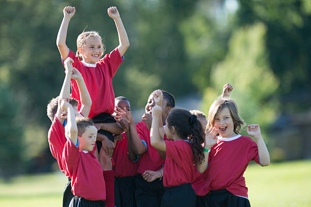 istock Holding a Teammate up in the Air 509620222