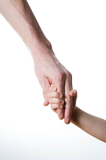 istock father giving hand to a child 509622106