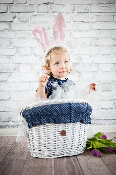 istock Cute baby bunny in the basket 509622495