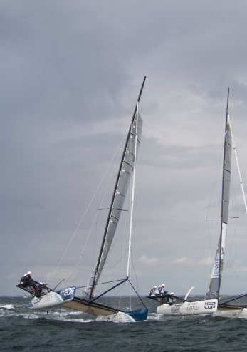 Three sailboats racing in the Indian Ocean