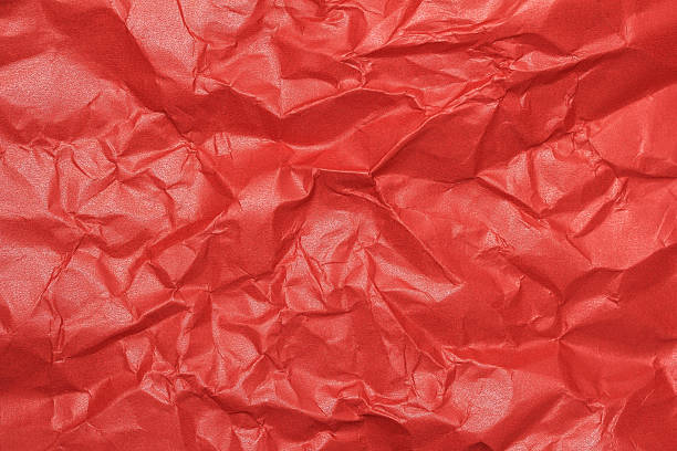 wrinkled red gloss paper wrinkled red gloss paper texture background wrapping paper stock pictures, royalty-free photos & images