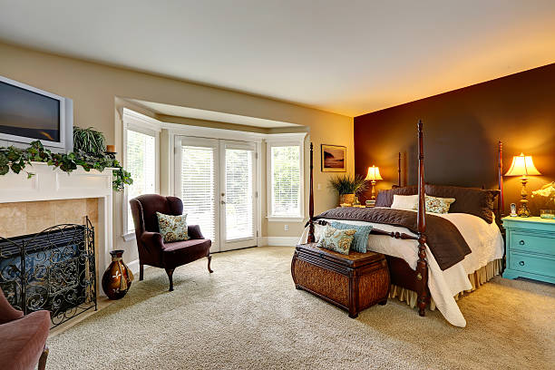 istock Luxury bedroom with  fireplace and walkout deck 509625791