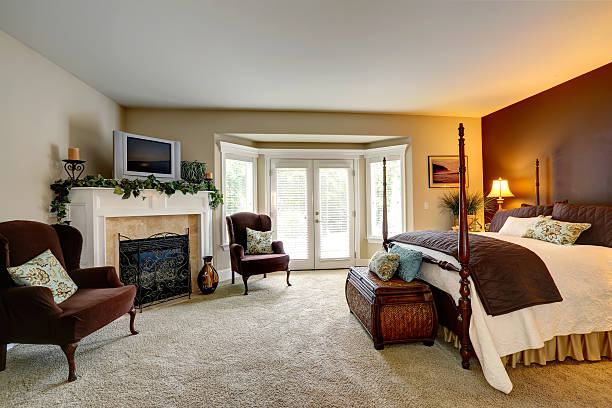 istock Luxury bedroom with  fireplace and walkout deck 509625823