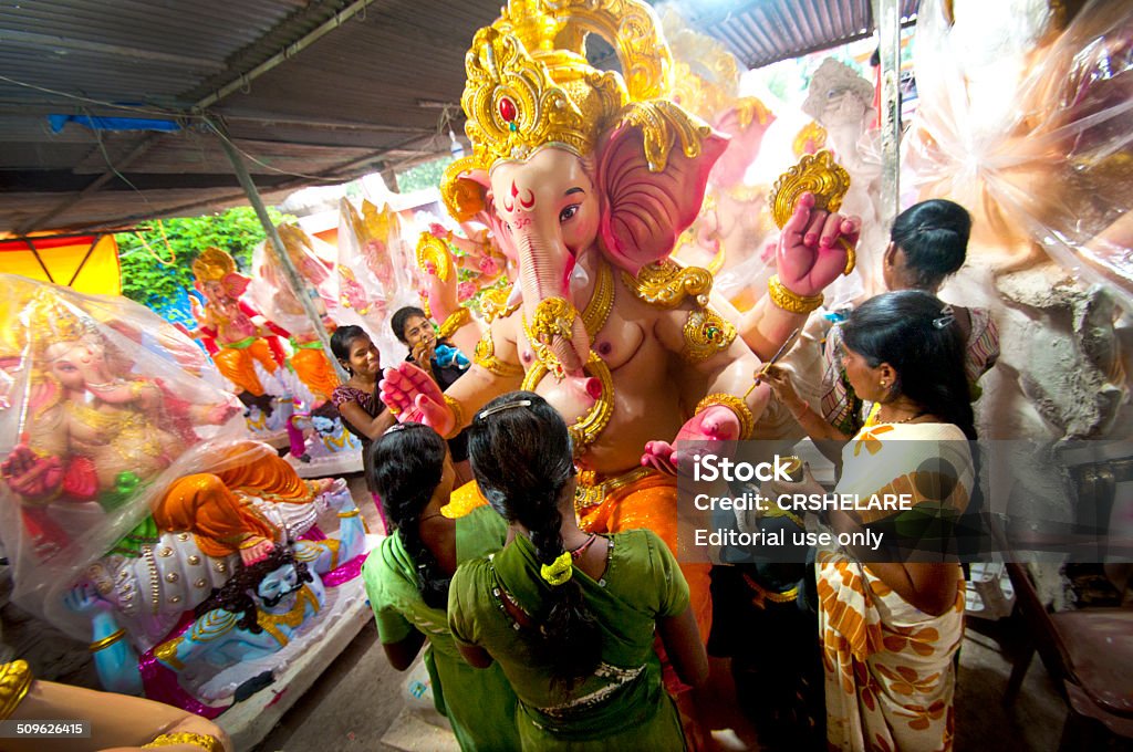 Artists preparing idol for Ganesha Festival in Maharashtra , India. Amravati,Maharashtra, India - August 28, 2014: Artists preparing idol for Ganesha Festival in Maharashtra , India. Art And Craft Stock Photo