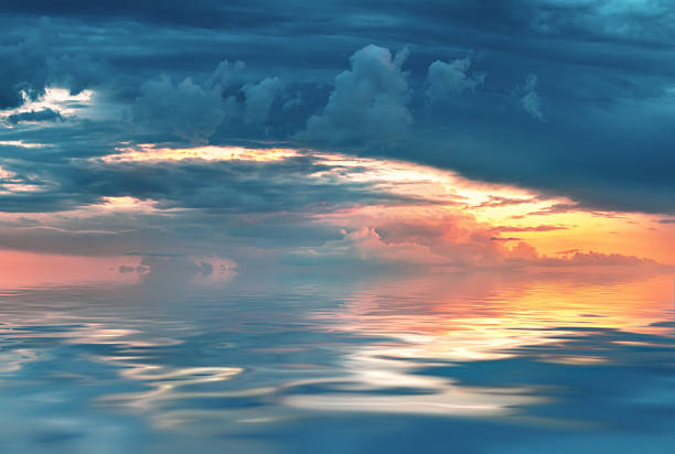 istock sky on r sunrise with clouds and  reflection in water 509628113