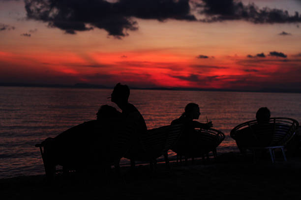 istock Friends enjoying sunset on the beach 509628669