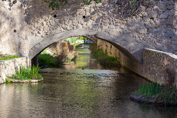 istock Arch stone bridge and pedestrian in the city Cuenca, Spain 509629122