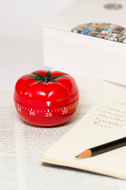 Pomodoro technique Pomodoro (tomato) technique is a study method that helps avoiding procrastination using a kitchen timer tomato sauce photos stock pictures, royalty-free photos & images