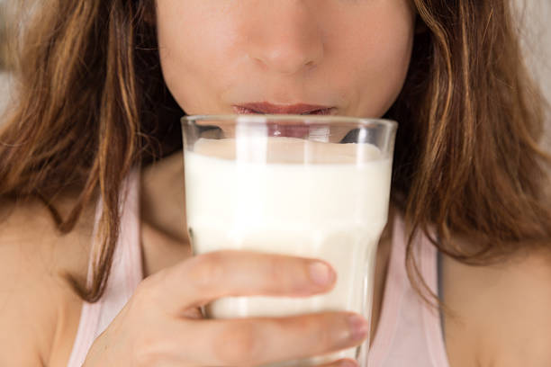 istock Woman drinking milk 509631182