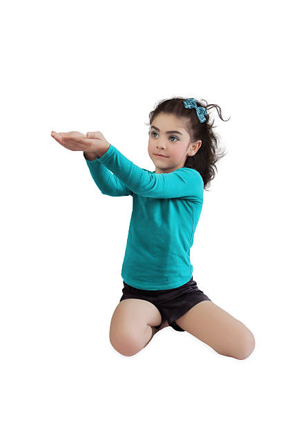 istock Little girl looks at his hands 509631268