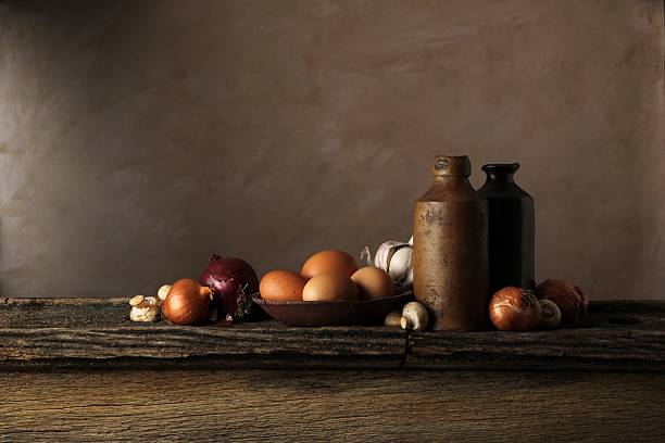 istock Clay Bottles, Eggs & Vegetables on Timber Shelf. 509633186