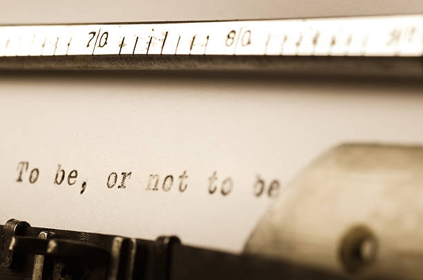 words to be or not to be  written on typewriter