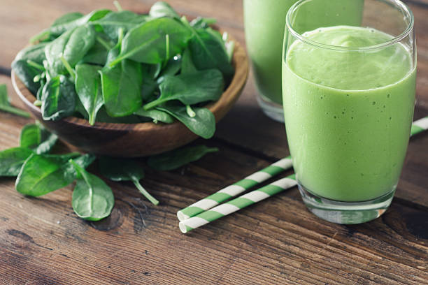Spinach Smoothie Spinach Smoothie, Made with Fresh Spinach and Non Dairy Milk. celery smoothie stock pictures, royalty-free photos & images