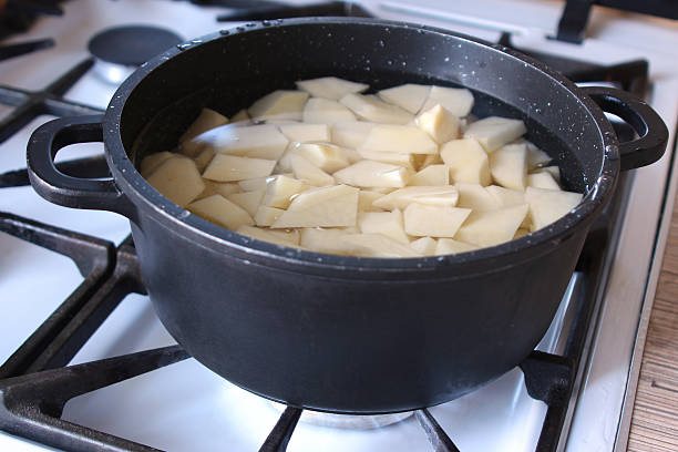 istock Potatoes in a saucepan on a gas hob 509635402