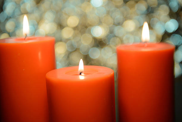 istock aromatic orange candle, bokeh background 509635412