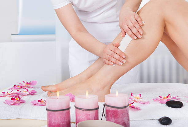 istock Beautician Waxing Woman's Leg 509639045