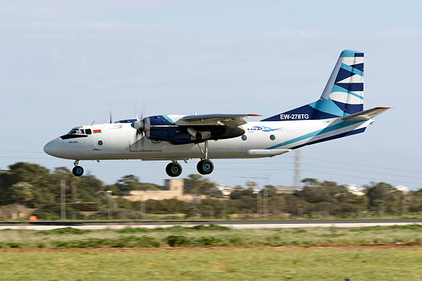 Cargo Antonov airplane Luqa, Malta February 11, 2016: Vulkan Air Antonov An-26B antonov an 26 stock pictures, royalty-free photos & images