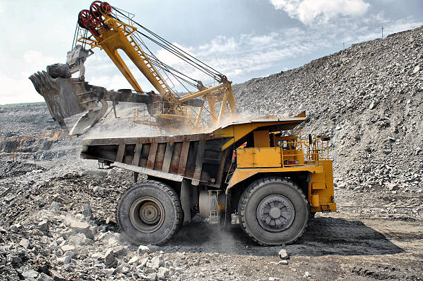 istock Loading of iron ore on truck 509640643