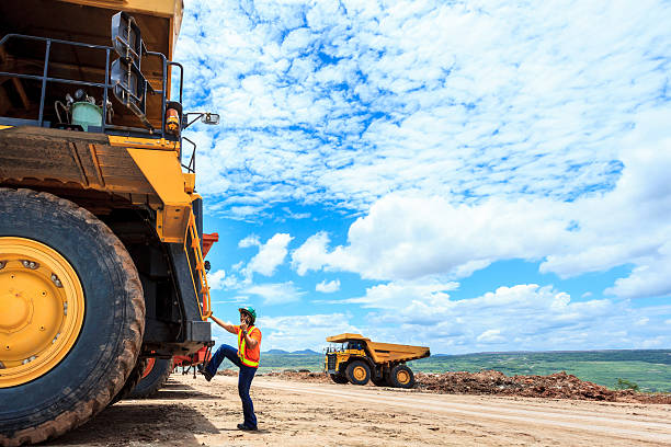 Working Women Working Women Big Truck Driver in Open Pit large machine stock pictures, royalty-free photos & images